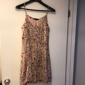 Flowery above the knee slip dress